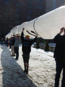  FSU students holding up a "Stop Cove Point" pipeline at the Baltimore rally. (Nadine Grabania/CitizenShale)