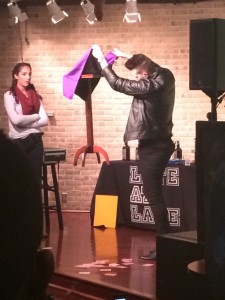 Illusionist Joel Meyers performing a ghost trick.