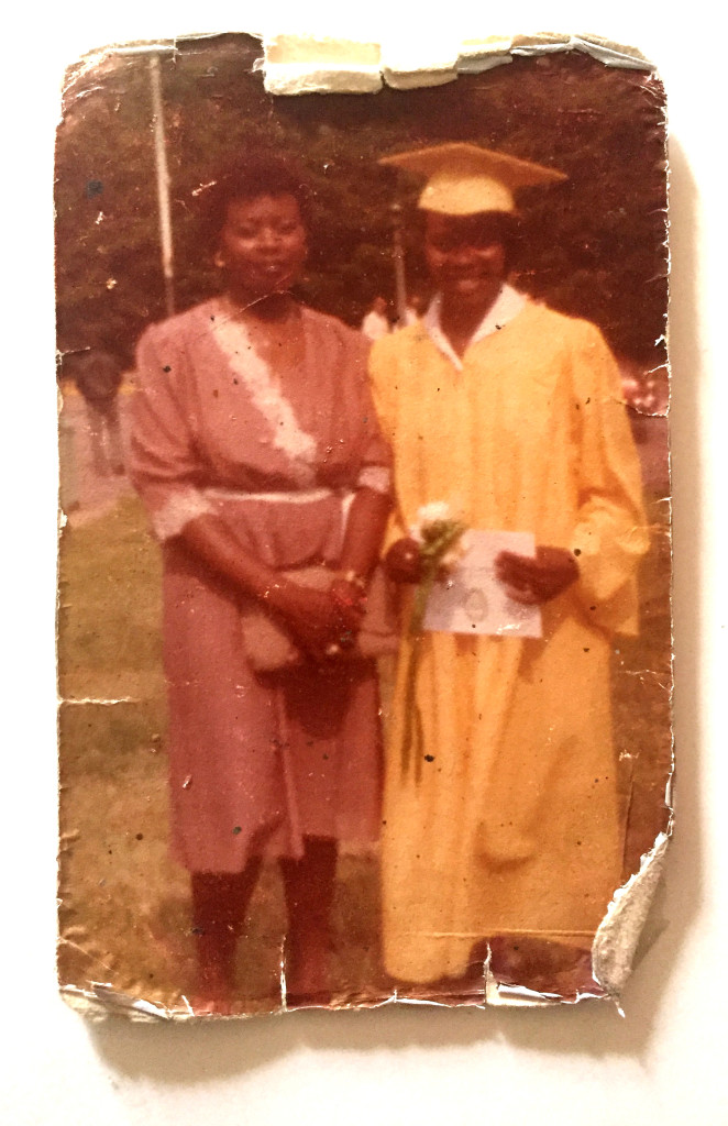 Joan, right, pictured with sister Marjorie, graduates from Eastern High School. Courtesy of the Charlton family.