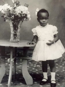 A young Joan Charlton poses for a childhood photo. Courtesy of the Charlton family.