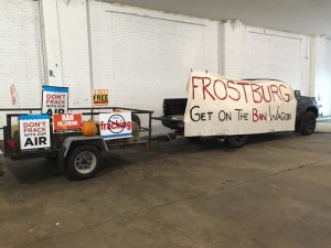 An actual wagon and a 13-foot-long banner reading, "Frostburg: Get on the Ban Wagon" at the rally. (Madie Wilson/ TBL)