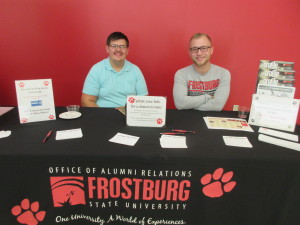 Ben Forrest and Chandler Sagal at the Alumni Welcome Center table.
