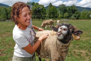 Brown working with rescued farm animals. Photo from: themighty.com