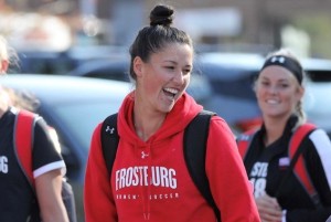 Dougall laughs with FSU players before their game at Davis & Elkins. // Photo Courtesy of Ed Vigezzi