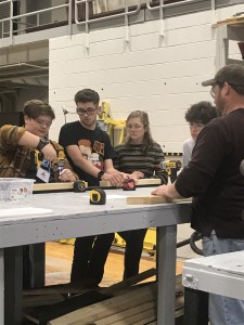 Students Spencer Samples and Brendan McCabe learn to use power tools to assist in building theatrical sets at the 2nd Annual Mountain Maryland Theatre Festival